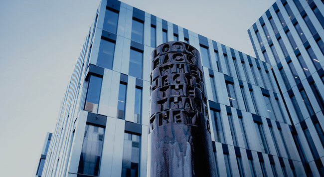 statue outside of an office building